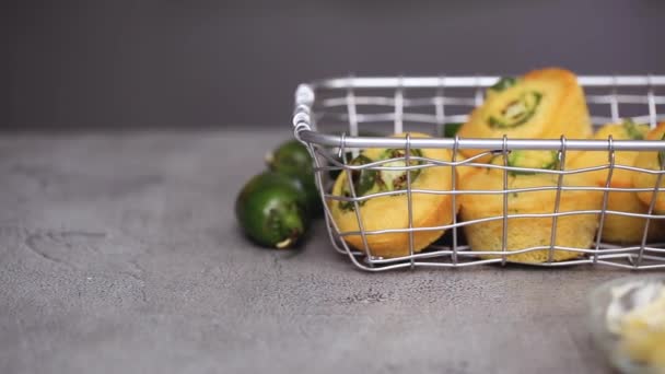 Close Fresh Baked Cornbread Jalapeno Muffins Grid Basket Table — Stock Video