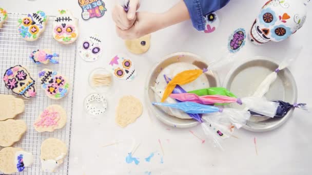 Overhead View Mother Daughter Decorating Sugar Skull Cookies Royal Icing — Stock Video