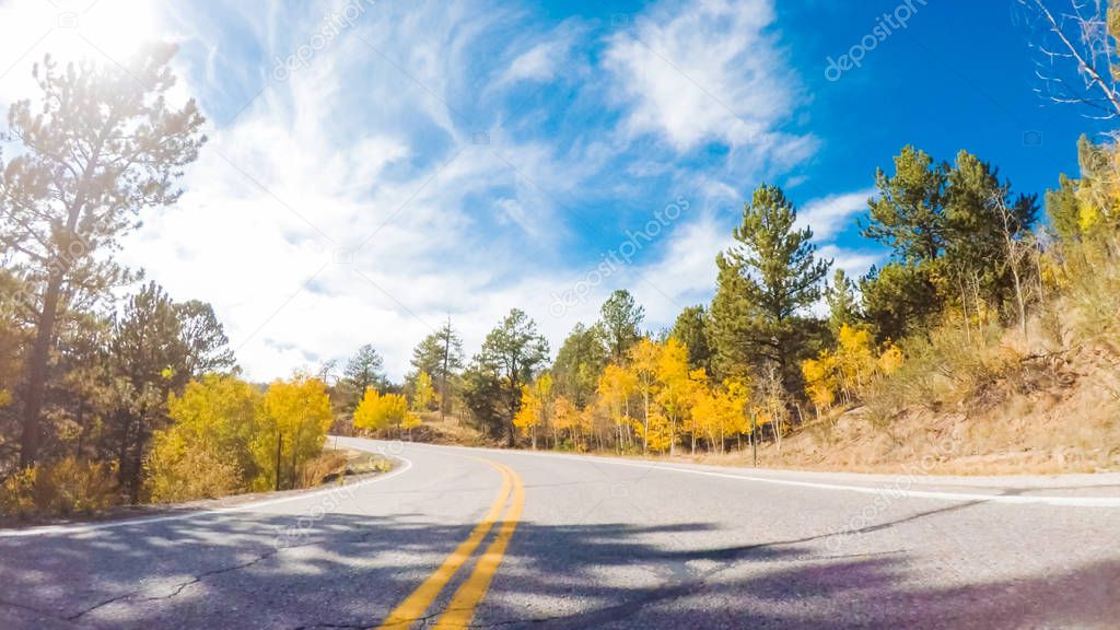 Driving on mountain highway 67 to Colorado Springs in Autumn.