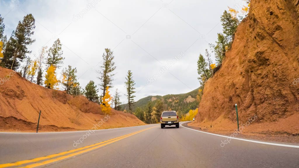 Driving on mountain highway 67 to Colorado Springs in Autumn.