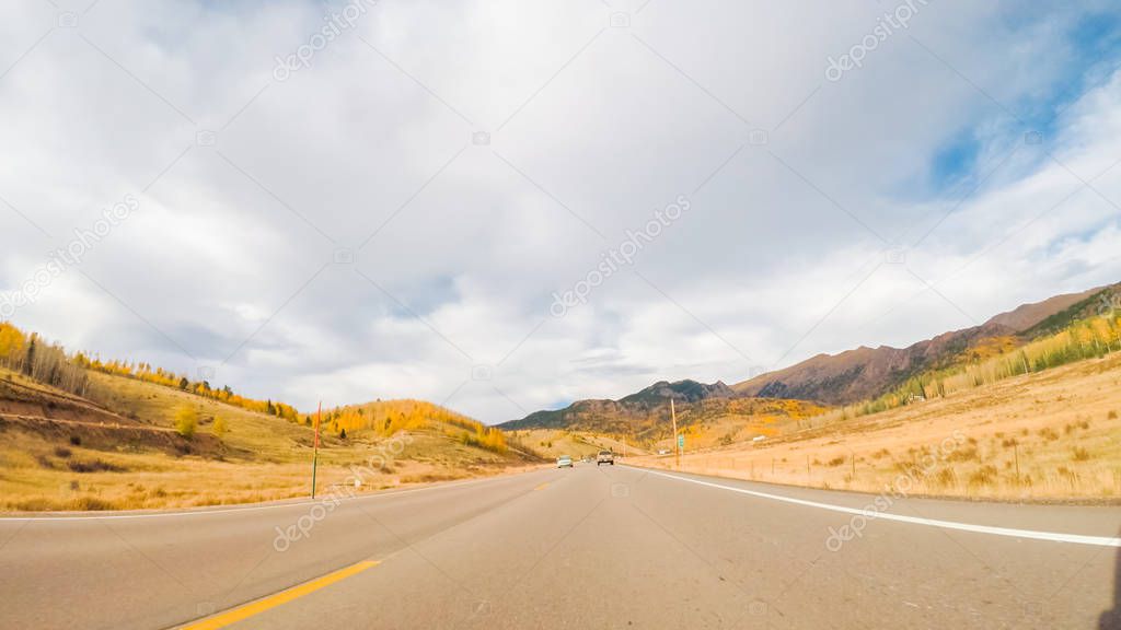 Driving on mountain highway 67 to Cripple Creek from Victor in Autumn.