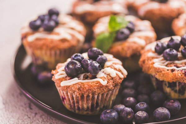 Homemade blueberry muffins made with organic ingredients.