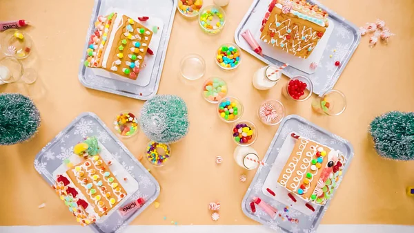 Flat Lay Kids Decorating Small Gingerbread Houses Christmas Craft Party — Stock Photo, Image