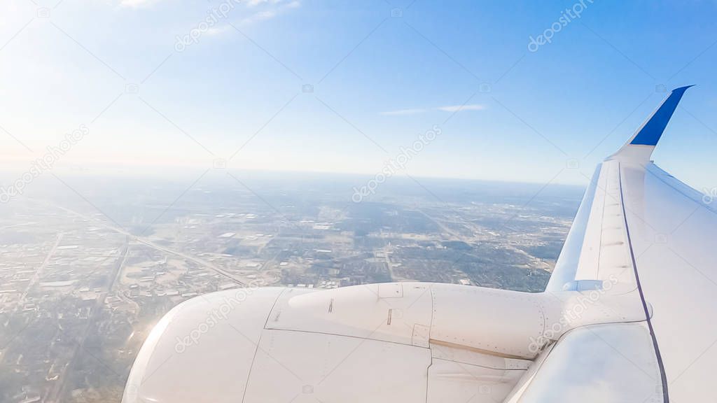 View from the window seat of commercial passenger airplane.