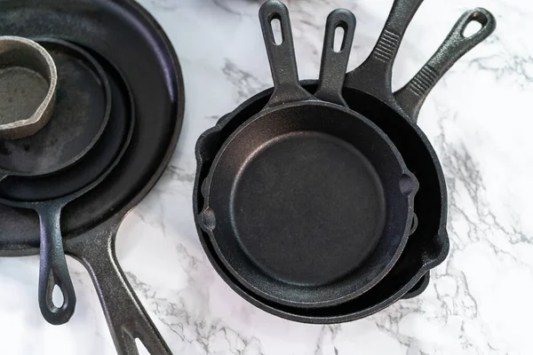 Variety Cast Iron Frying Pans Marble Background — Stock Photo, Image