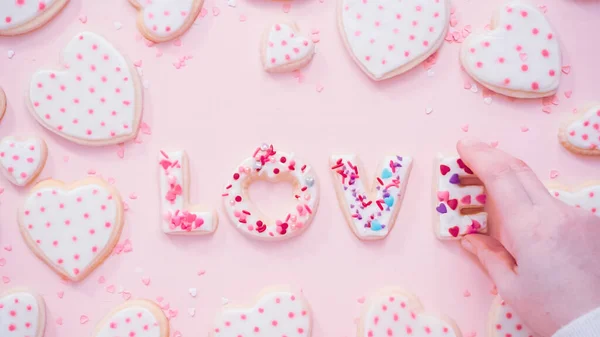 Acostado Señal Amor Del Día San Valentín Sobre Fondo Rosa — Foto de Stock
