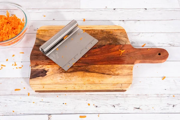 Grated Organic Orange Carrots Wood Cutting Board — Stock Photo, Image