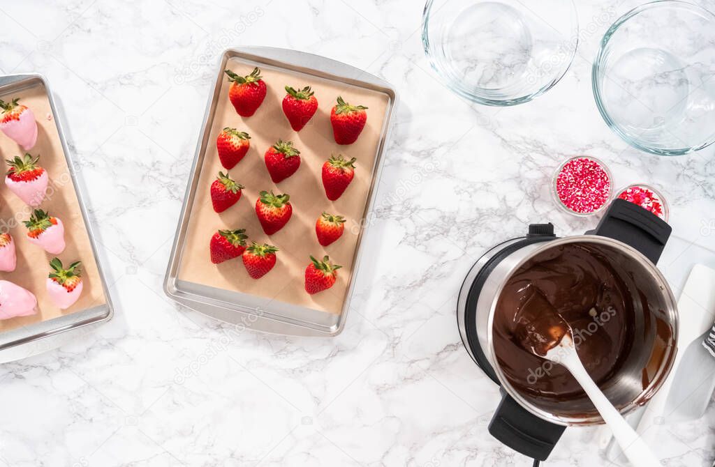 Flat lay. Ingredients to prepare chocolate dipped strawberries.