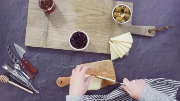 Arranging Gourmet Cheese Crakers Fruits Board Large Cheese Board — Stock Video