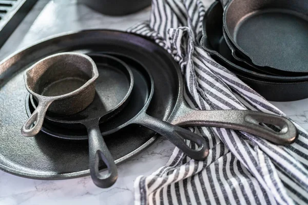 Variety Cast Iron Frying Pans Marble Background — Stock Photo, Image