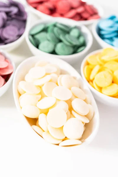 Rainbow Colors Chocolate Chips White Bowls Melting Chocolate Shapes White — Stock Photo, Image