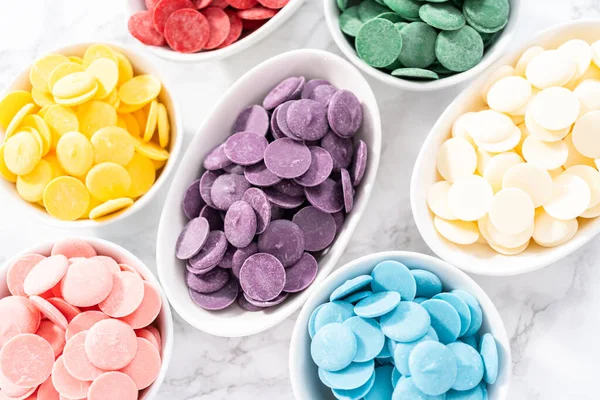 Rainbow Colors Chocolate Chips White Bowls Melting Chocolate Shapes Marble — Stock Photo, Image