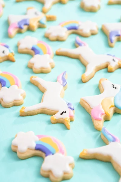Unicorn Sugar Cookies Decorated Royal Icing Food Glitter Blue Background — Stock Photo, Image