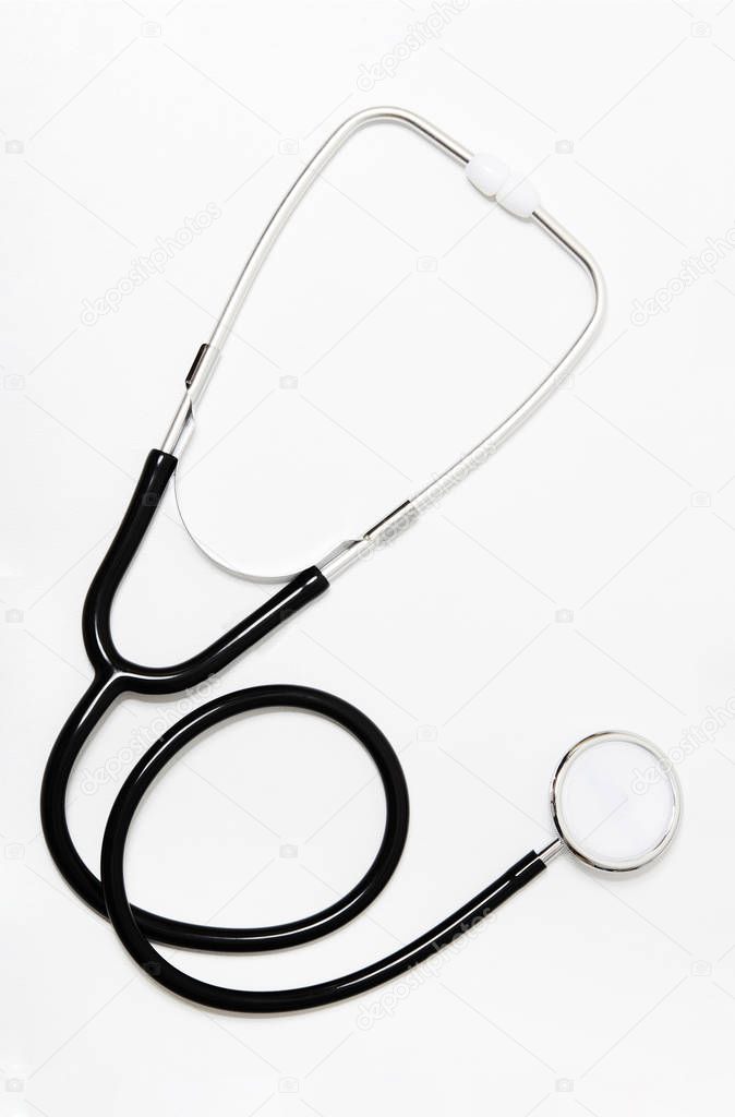 Black stethoscope isolated on white background.