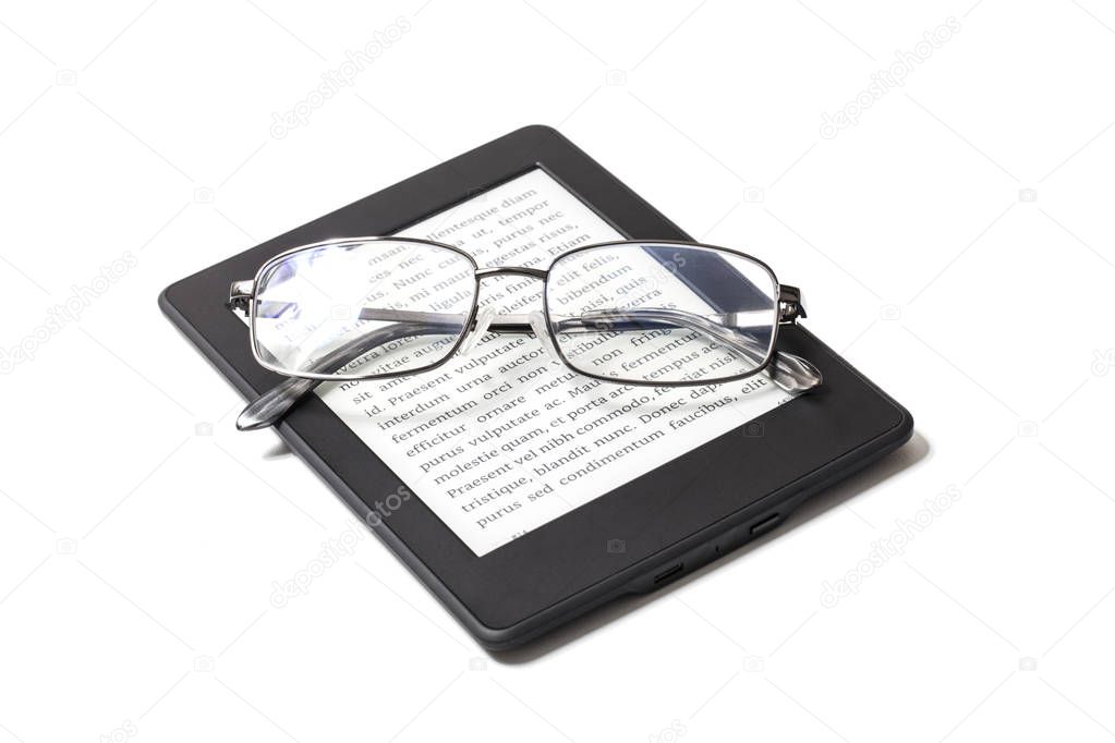 Book reader and reading glasses on white backgrounds.