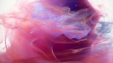 Su akan mürekkep renkleri soyut. Mor, sarı ve turuncu mürekkep renkleri.