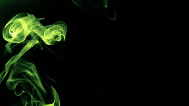 Green smoke on black background and darkness concept — Stock Video