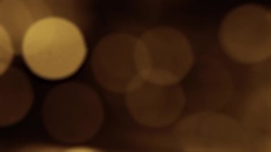 Altın bokeh parçacıklar sarı arka plan