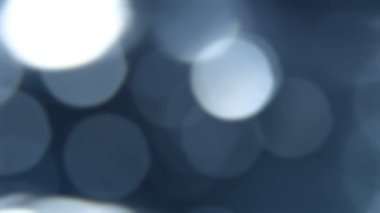 Mavi, bulanık, bokeh arka ışıklar. soyut parıldıyor.