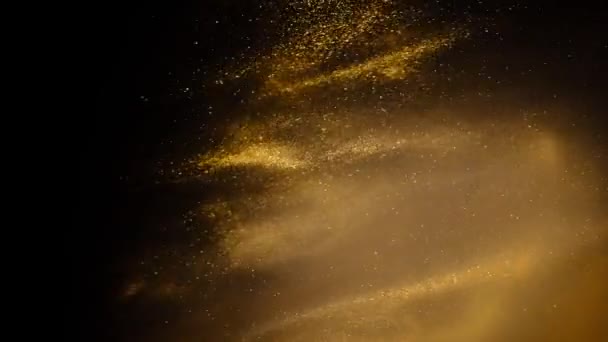 Arena dorada o polvo creando formaciones abstractas de nubes. Fondos artísticos . — Vídeo de stock