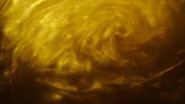 Goldener Sand oder Staub schaffen abstrakte Wolkenformationen. Kunstgeschichte. — Stockvideo