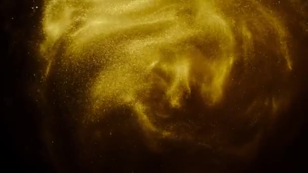 Χρυσή άμμος ή σκόνη δημιουργώντας αφηρημένα σύννεφο σχηματισμούς. Τέχνη φόντα. — Αρχείο Βίντεο