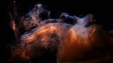 Soyut bronz boya. Siyah bir arkaplanda çekim yapmak.