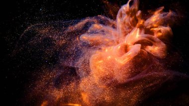 Soyut bronz boya. Siyah bir arkaplanda çekim yapmak.