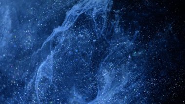 Işıltılı mavi parçacık arka plan. Evren mavi toz siyah arka plan üzerinde yıldız ile. Parçacıkların hareket soyut.