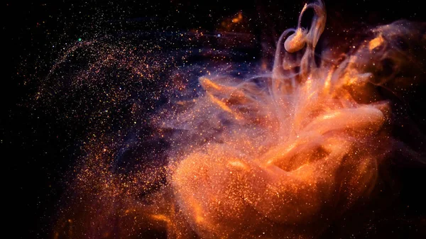 Soyut bronz boya. Siyah bir arkaplanda çekim yapmak.