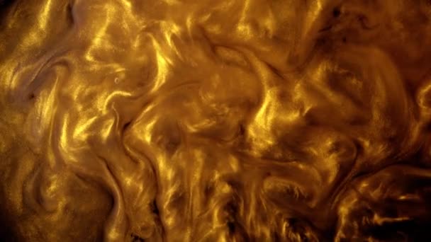 Goldener Sand oder Staub schaffen abstrakte Wolkenformationen. Kunstgeschichte. — Stockvideo
