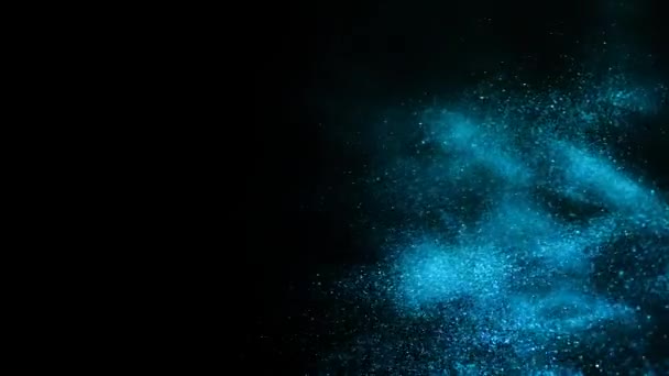 Blue glitter on a black background. — Stock Video