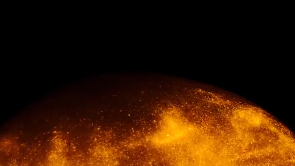 Goudkleurig zand of stof creëert abstracte formaties in de vorm van de zon op een zwarte achtergrond. Kunstachtergronden. — Stockvideo