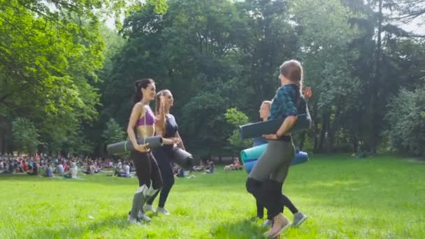 Group of five fit happy women giving high five in park after workout,celebrating success.Setting goals, achieving team result.Teamwork, unity, support, motivation,active healthy life benefits concept — Stock Video