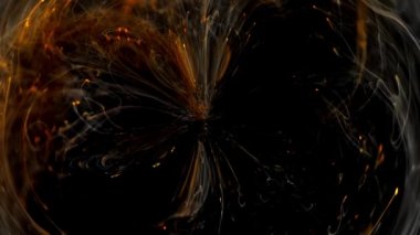 Mürekkep girdabı. kırmızı parıltılı duman dairesi hareketi.