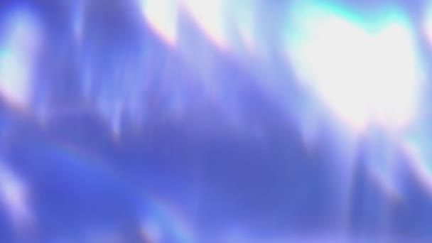 Перемещение синих блестков огни, разряженные световые отражения петля боке фон — стоковое видео