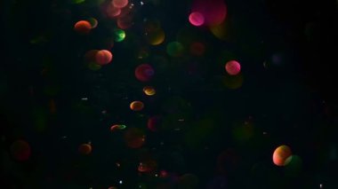 Soyut arkaplan parlayan altın parçacıkları. Parıldayan Parçacıklar