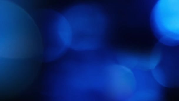 구체적 인 푸른 입자들. 배경보케 — 비디오