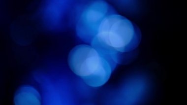 Mavi Parçacıklar. Arkaplan Bokeh Bulanık