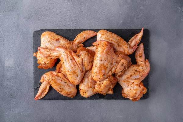 Marinated chicken wings ready to cook. Top view