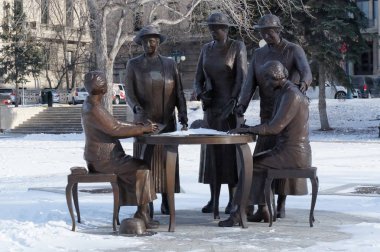 Winnipeg, Manitoba, Canada - 2014-11-21: Nellie McClung Memorial. Monument by Helen Granger Young was devoted to obtaining the right to vote by Manitoba women in 1916 clipart