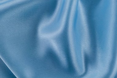 İpek lüks arka plan, bez, ışık mavi bez doku parçası.