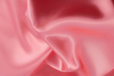 İpek lüks arka plan, bez, hafif pembe bez doku parçası.