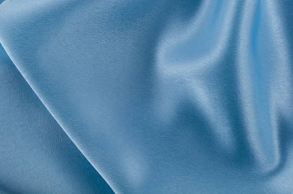 İpek lüks arka plan, bez, ışık mavi bez doku parçası.