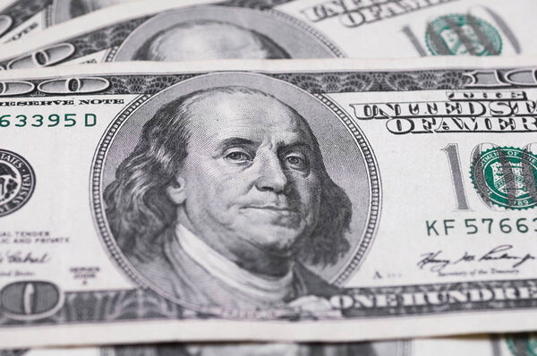 Dollars closeup. Benjamin Franklin's portrait on a  bill.Concept of money and earnings.