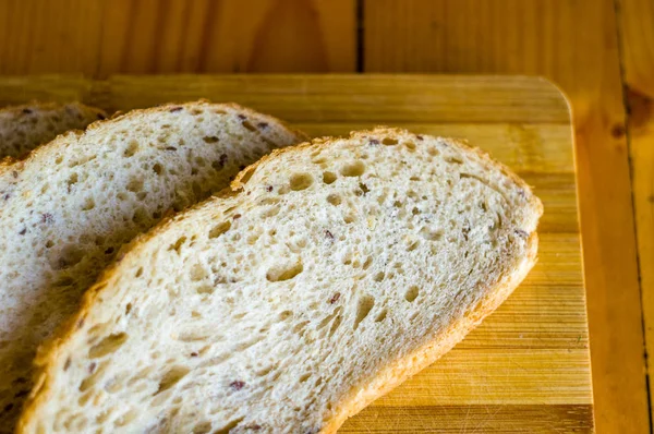 sliced whole wheat breads on a chopping Board