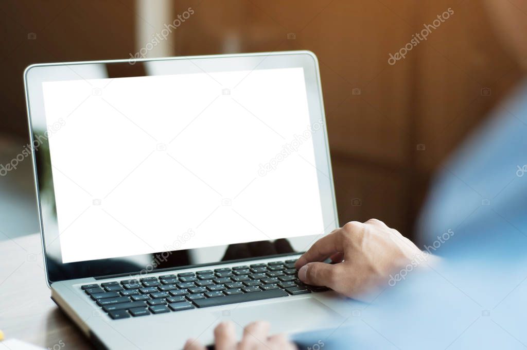businessman using  laptop with blank screen at cafe