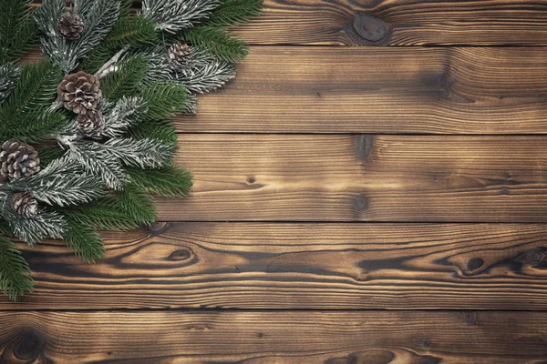 Рождественские украшения на деревянном фоне — стоковое фото