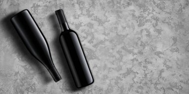 Şablon kavramı iki şişe şarap, tasarım ve reklamcılık Şirket tanıtımı için koyu gri beton zemin üzerine ürünün. Şarap şişesi mockup kopya alanı ile. Üstten görünüm