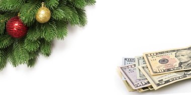 Noel süsleri çam dalları ve bize para dolar ya da nakit banknot ile